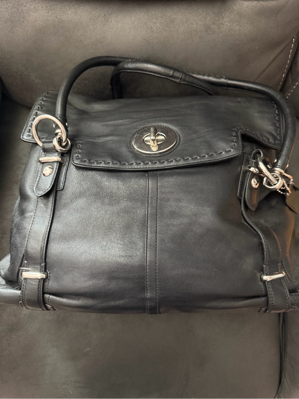 black leather Coach XL Hampton Tote featuring silver-tone hardware. - Picture 1 of 6